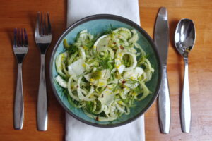 crisp fennel salad with olives on table